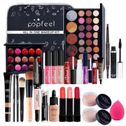 all-in-one makeup kit with eyeshadow palette, lipsticks, lip gloss, foundation, concealer, mascara, eyebrow pencil, brushes, and makeup bag