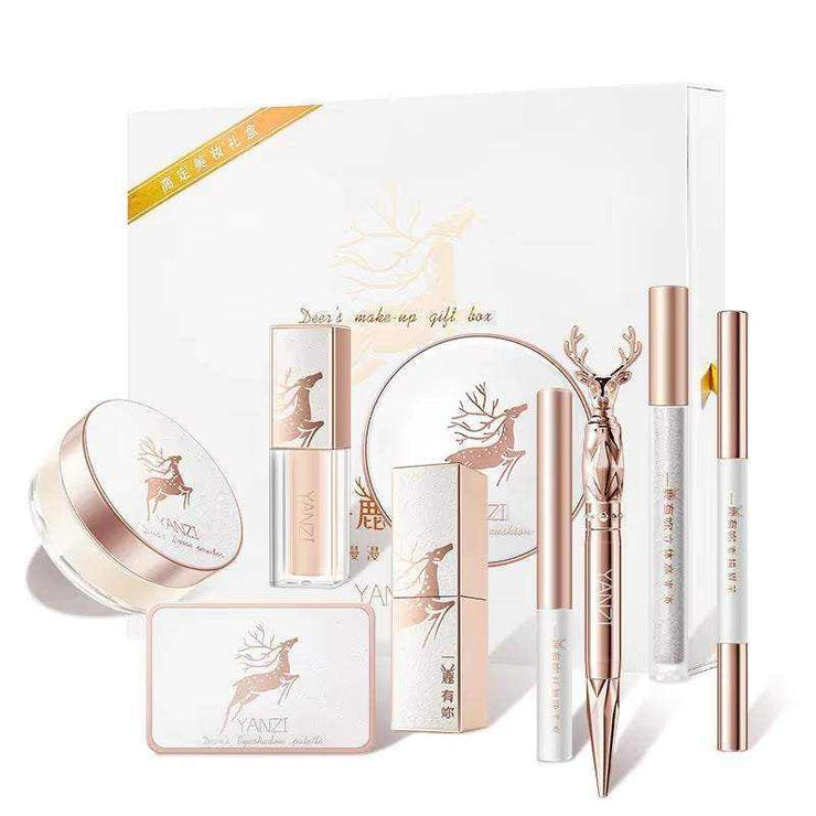 9-piece elegant makeup set with powder, foundation, concealer, and eyeliner in festive gift box