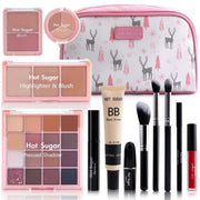 Travel makeup kit all-in-one with eyeshadows, blush, highlighter, BB cream, brushes, and pink cosmetic bag.