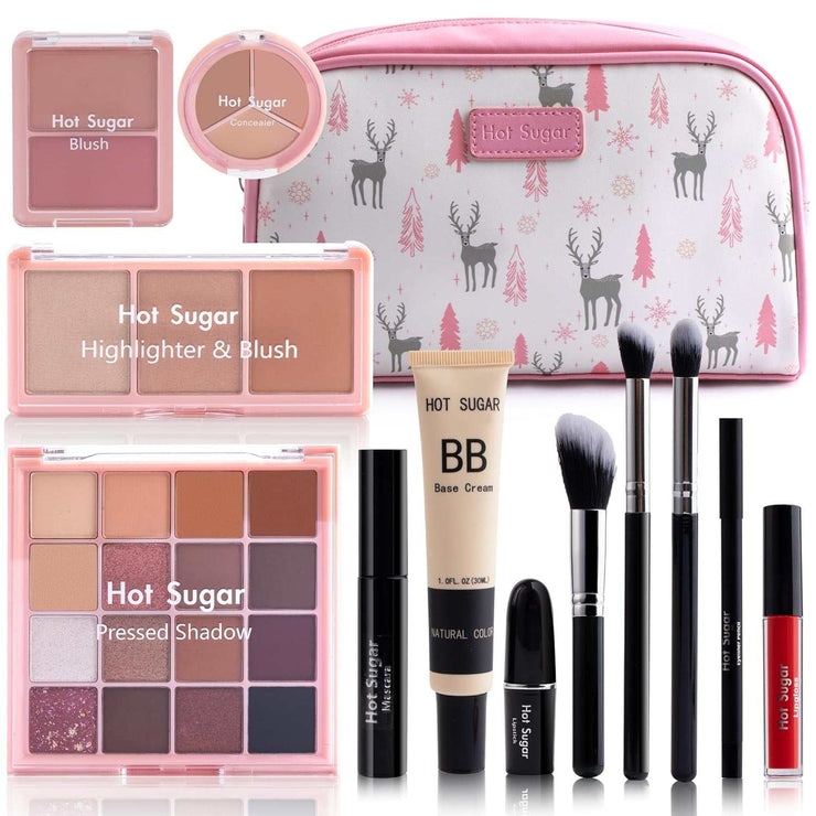 Travel makeup kit all-in-one with eyeshadows, blush, highlighter, BB cream, brushes, and pink cosmetic bag.