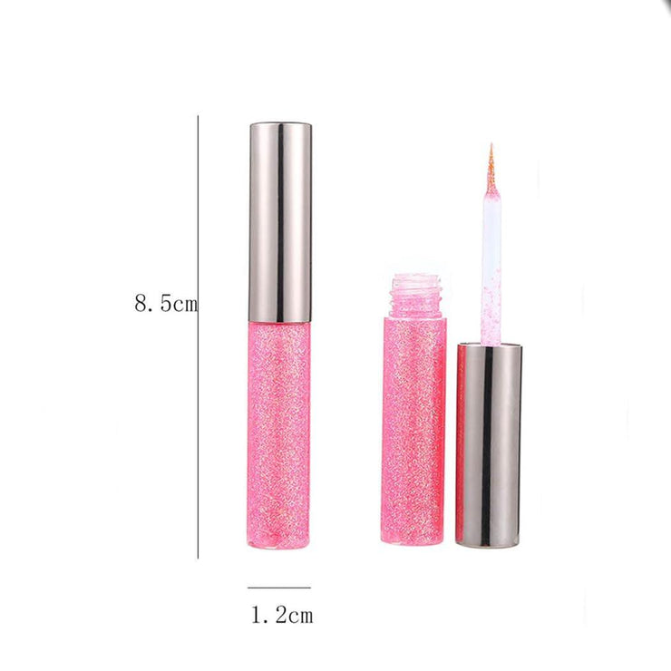 Pink glitter liquid eyeliner with metallic shimmer and felt tip applicator for smooth, vibrant eye makeup.