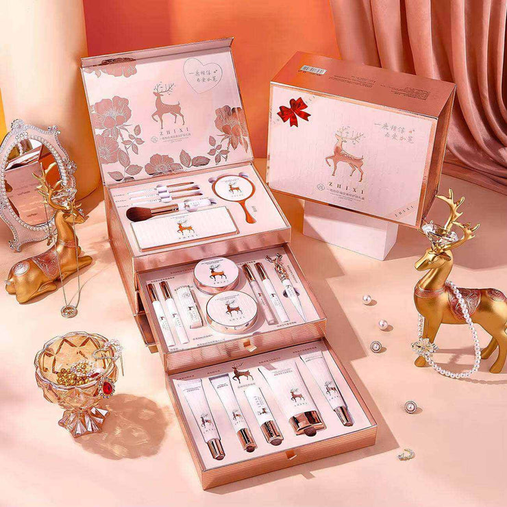 20 pcs makeup set box with lipstick, eyeshadow, brushes, and skincare products in a pink gift box with deer design