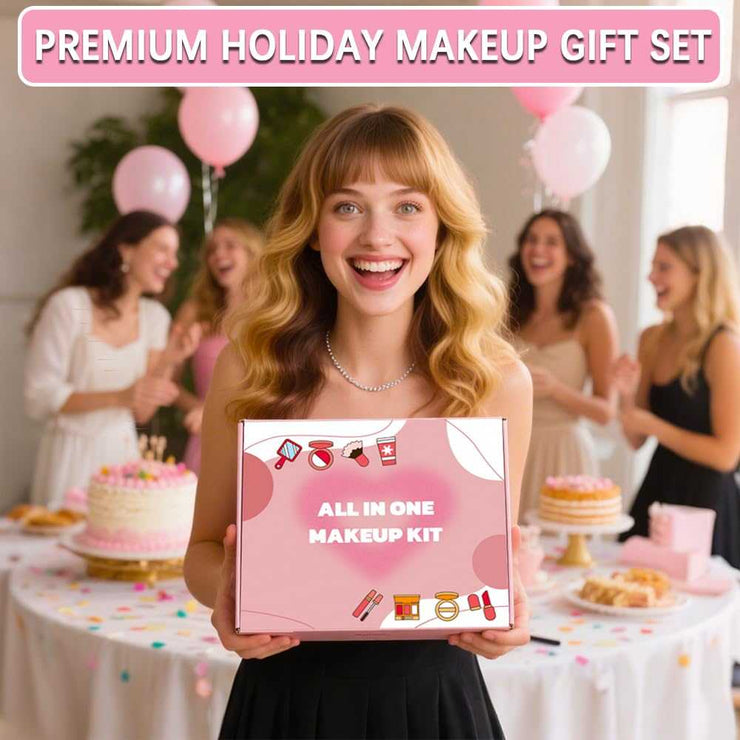 Smiling woman holding pink All-in-One Makeup Kit box at festive party with balloons and cakes in background