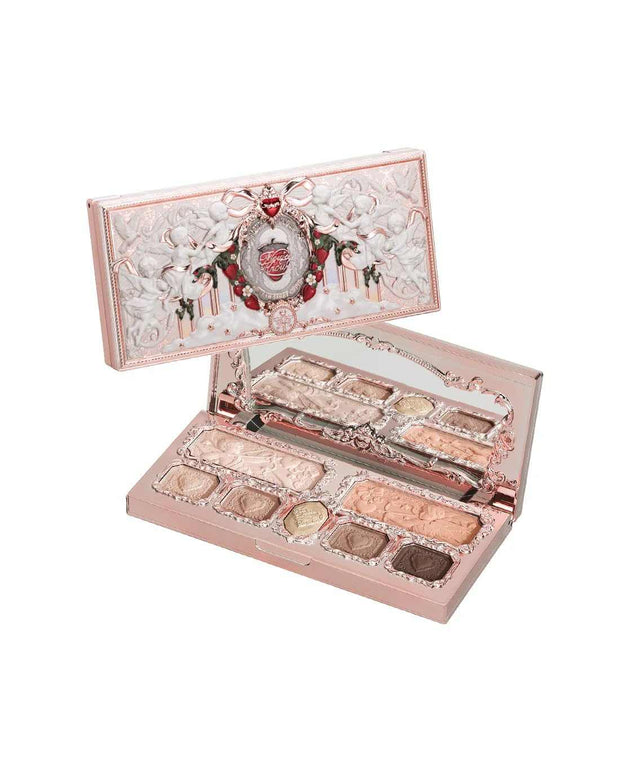 Strawberry Cupid Makeup Palette with matte and shimmer pink eyeshadows, blush, highlight, and contour in a compact case with mirror