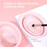 Pink foldable cosmetic brush cleaning bowl with textured surface for washing makeup brushes from professional makeup tools kit