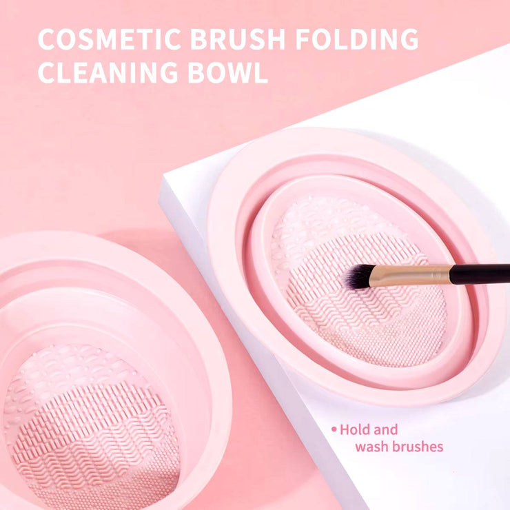 Pink foldable cosmetic brush cleaning bowl with textured surface for washing makeup brushes from professional makeup tools kit