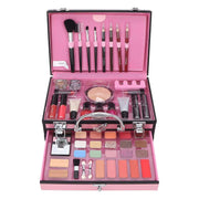 Full makeup kit with brushes, lipsticks, eyeshadows, and powders in a portable pink case for daily and professional use