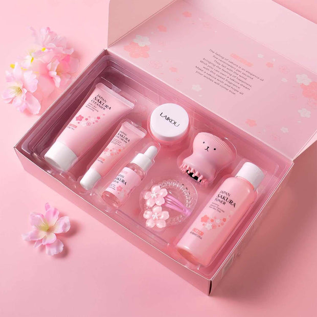 Pink Sakura Beauty Skin Care Set gift box with cleanser, toner, serum, eye cream, face cream, and travel kit for teenage girls and women