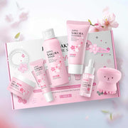 Sakura beauty skin care set with cleanser, toner, serum, creams, and travel kit in pink packaging for teenage girls and women
