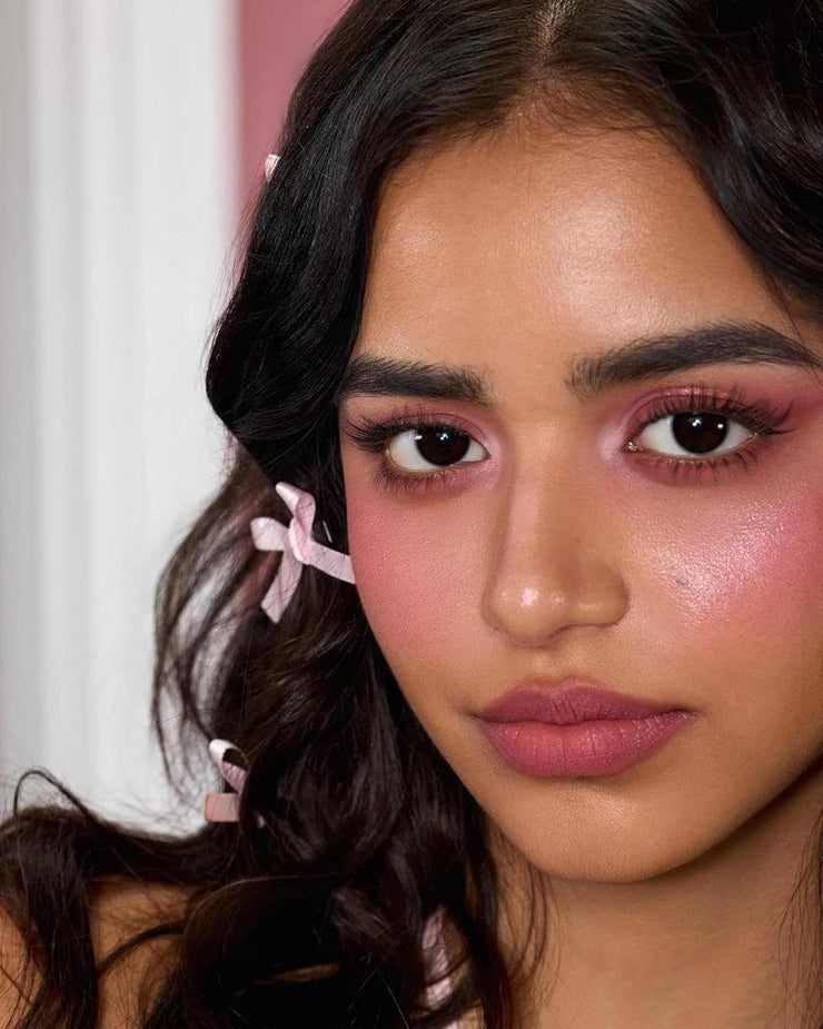 Strawberry Cupid Makeup Palette pink eyeshadow blush highlighting contour on model face