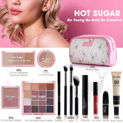 Travel makeup kit all-in-one with pink cosmetic bag, eyeshadows, blush, foundation, lipsticks, and brushes for women on the go