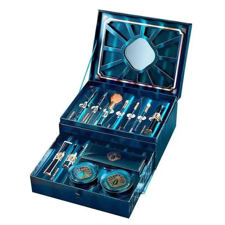 Luxury makeup gift set with full face collection including brushes, BB cushion, eyeshadow, lipstick, and mirror in elegant blue box